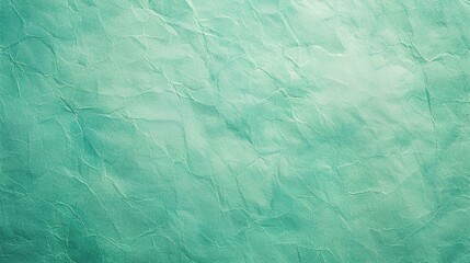 Obraz premium Light green crumpled paper texture.