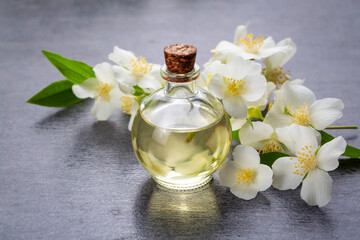 Jasmine essential oil in a glass bottle