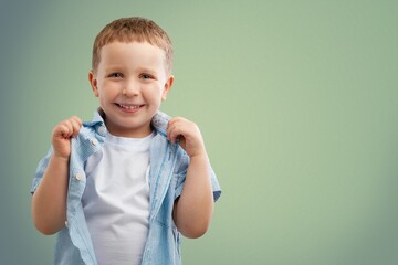 Portrait of smart small kid raising finger