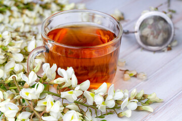 Glass cup of herbal acacia tea