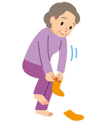 立ったまま靴下を履く高齢者　健康　介護