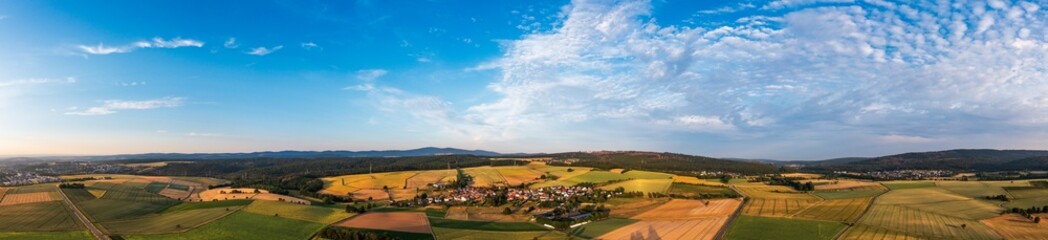Panoramic shot from above of the Taunus landscape with a small village