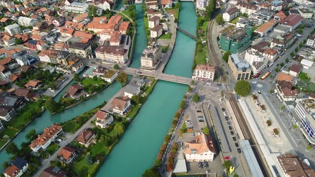 Interlaken, Switzerland: Aerial downward drone footage of the Interlaken old town with the Aar river in Canton Bern in Switzerland.