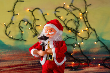 Santa Claus and Christmas puppets on abstract background with copy space