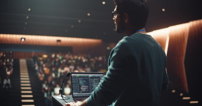 Open Lecture at an University Campus: Post Graduate College Student Making a Software Company Presentation to a Group of Students. Young Indian Man Giving Advice on Career Opportunity