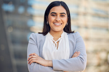 Business woman, confident and portrait in city, employee and proud of career opportunity in town. Female person, arms crossed and smile for urban satisfaction, professional and lawyer in outdoor