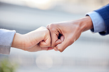 Fist bump, business people and support in outdoor for team building, trust and agreement or thank you. Colleagues, collaboration and motivation in meeting, solidarity and unity or teamwork power