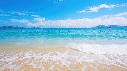 Fototapeta premium A wide panorama of a serene beach with glistening sand, gentle ocean waves, and a beautiful blue sky.