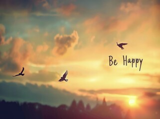 Obraz premium Be Happy written in the sky with birds flying, beautiful sunset.