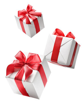 White gift boxes with red bow