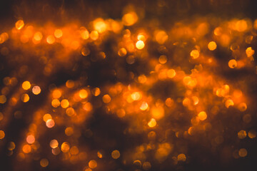 Bokeh from blurred orange flame background