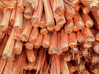 Detailed close-up of a heap of frayed and cut copper wires with visible strands and natural...