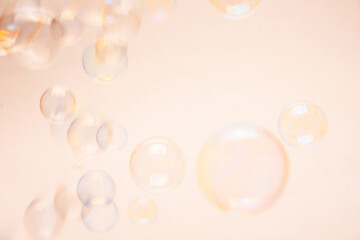 soap bubbles on a pink