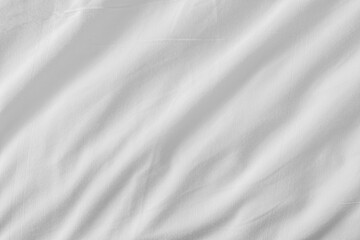 Naklejka premium Close up white wrinkled fabric texture rippled surface, Soft focus.