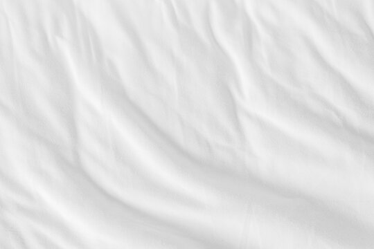 Close up white wrinkled fabric texture rippled surface, Soft focus.