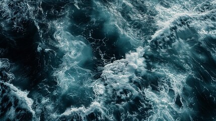 Aerial view to ocean waves. Blue water background. Waves background