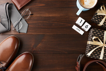 Flat lay with Father's Day gifts, including shoes and a tie, ideal for lifestyle magazines and e-commerce platforms promoting Father's Day