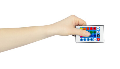 remote control for lamp in hand, outstretched hand with remote control for lamp isolated from background