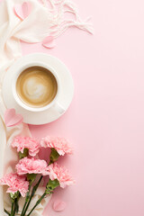 Cozy morning setup featuring a cup of coffee and vibrant pink carnations on a draped fabric, perfect for lifestyle, wellness, and relaxation themes