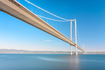 Osmangazi Bridge (Izmit Bay Bridge) located in Izmit, Kocaeli, Turkey. Suspension bridge captured with long exposure technique