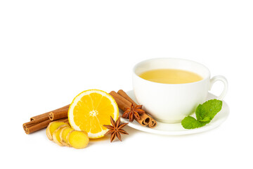 Fragrant hot tea with cinnamon stick and anise isolated on white background. A cup of hot tea with...
