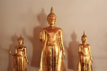 Golden Buddha statues lined up. Phra Rabiang is one of the elements built around the Wat Pho temple...