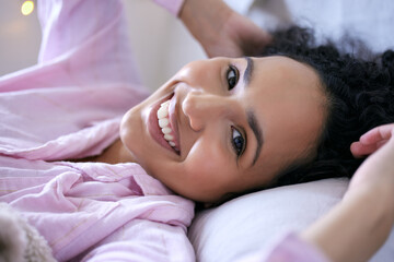 Woman, happy or morning portrait in bedroom with pyjamas for wake up rest and relax sleep. Excited,...
