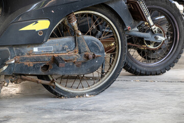 The Remains of an Old, Non-Functional Motorcycle Parked in a Motorcycle Graveyard, Awaiting...