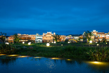 Obraz premium The glowing sphere on the field, Moon Field, Lizhuang Ancient Town, Sichuan, China