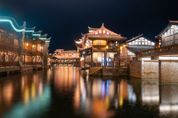 Obraz premium At night, the beautiful ancient town of Lizhuang on the lake, Yibin City, Sichuan Province, China