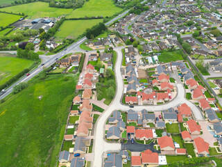 Drone UAV view of a new bungalow development for both working and retired people seen at the edge...