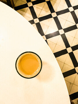 A cup of chai on the table (Mumbai, India)