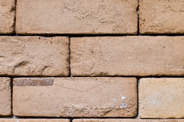 Close-up of the brick wall. Details of the brick wall, wall background. Building abstract, building wall background.