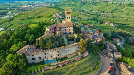 Ancient castle in the town of Cigognola, a view of town from a height. Drone photo