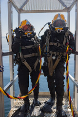 Commercial diver prepared for deep water entry