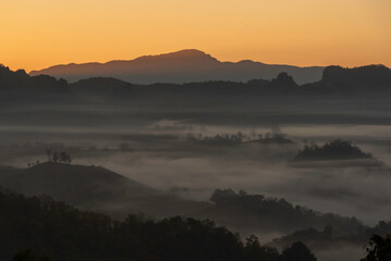 Obraz premium Mountain valley during sunrise. Natural summer landscape