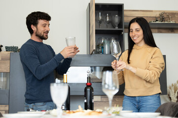 couple setting the table at home