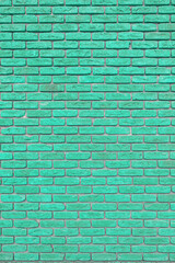 Green brick wall. Abstract interior background.