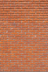 Fototapeta premium Red brick wall. Abstract interior background.