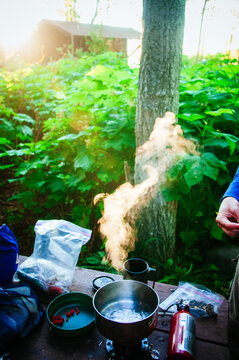Steam rises from a cook pot at a camp site in Isle Royale National Park.