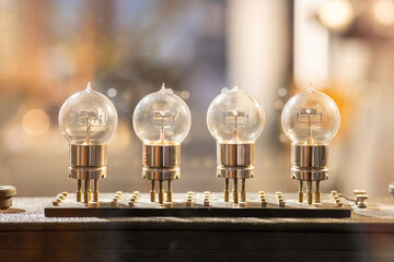 Row of glowing vintage vacuum tubes