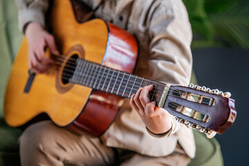 A person is playing a guitar.