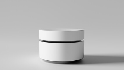 a white container with a lid on a gray surface