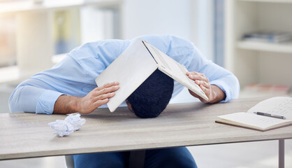 Frustrated, business man and laptop on head with documents in office for overworked, burnout or...