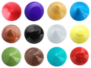Set with paint blobs of different colors isolated on white, top view