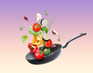 Frying pan and different vegetables in air on color gradient background