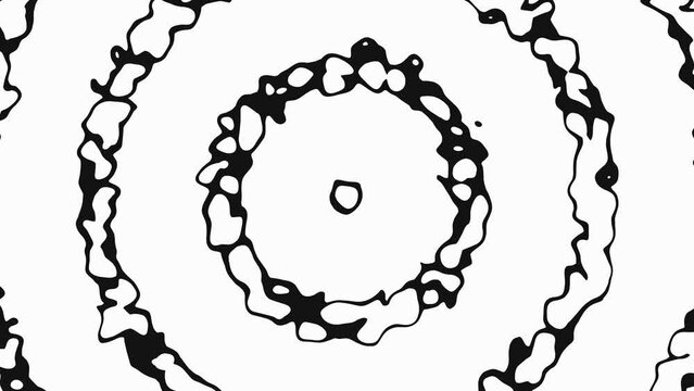 A monochrome drawing of a symmetrical circle, resembling a bicycle drivetrain part. The intricate pattern includes elegant eyelashlike details, created with precise line art