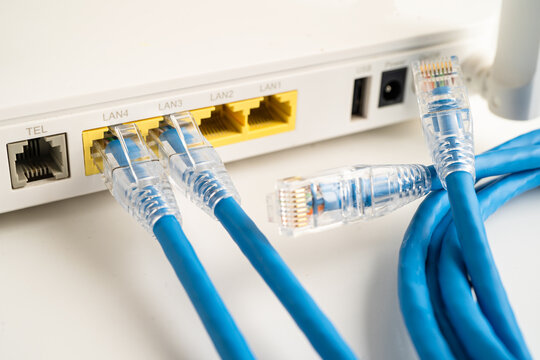 Ethernet cable with wireless router connect to internet service provider internet network.