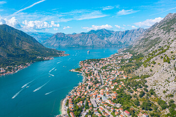 Spectacular View of Kotor Bay: Mountains, Cruise Ship, and Azure Waters