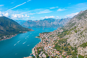 Exploring Kotor Bay: Aerial Shot of Mountains, Sea, and Cruise Ship